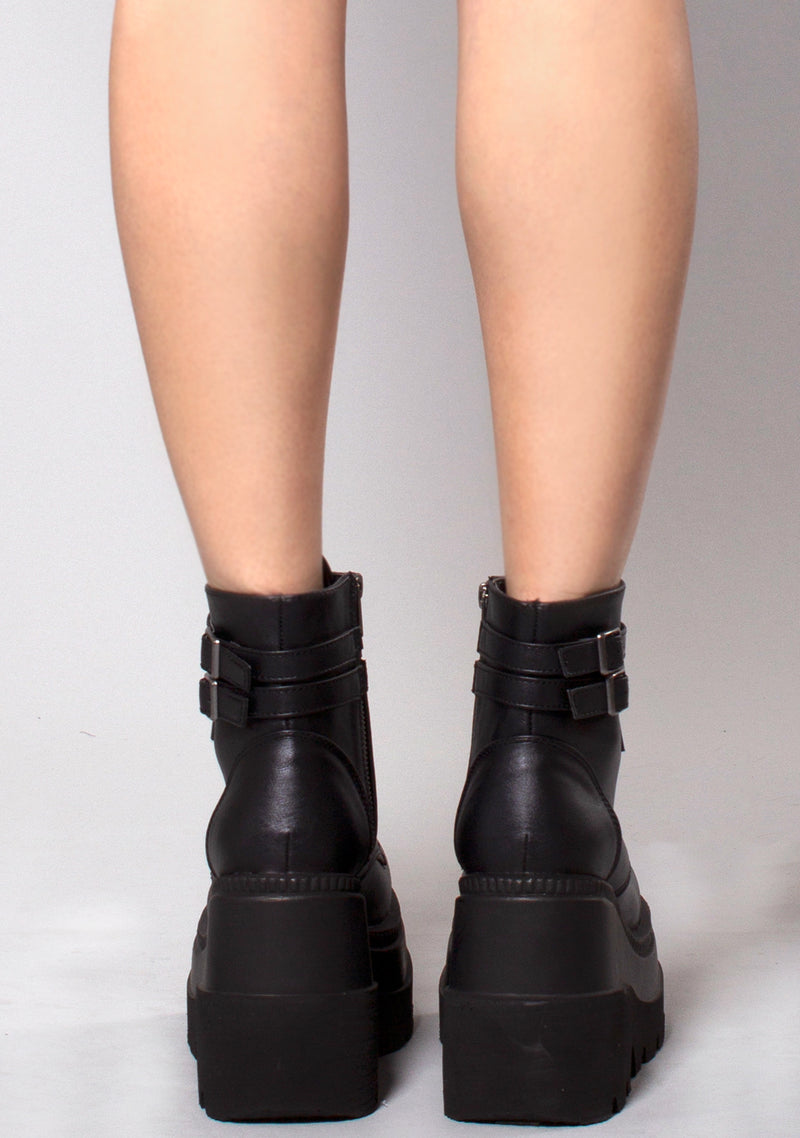 Demonia Shaker Platform Boots in Black